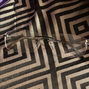 Stylish Rimless Eyeglasses with Black Accents